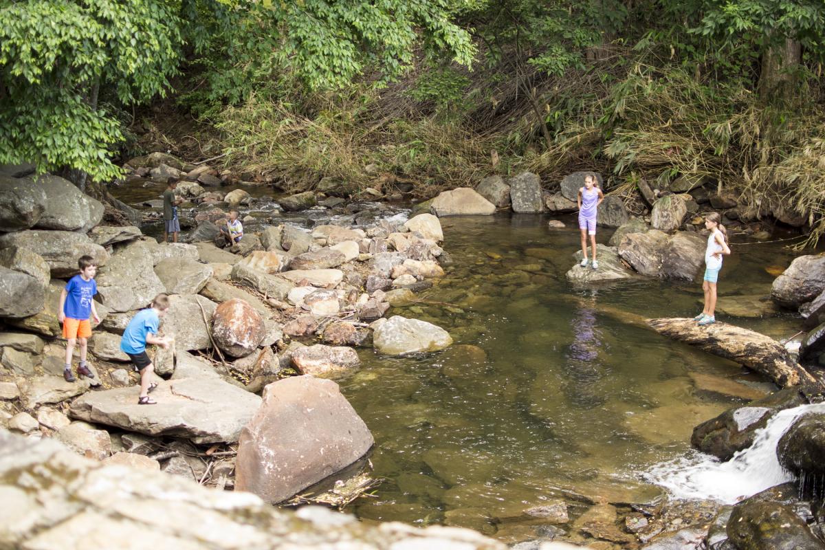 Kids playing in creek