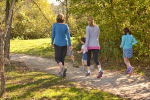 Family walking on trail