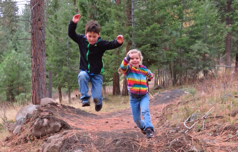 Kids running down the trail