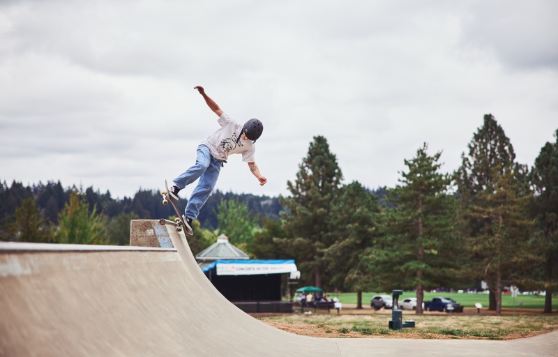 Skateboarder does a trick at Happy Valley Park