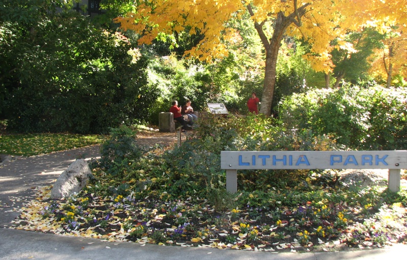 A sign reading "Lithia Park" welcomes visitors to the park.