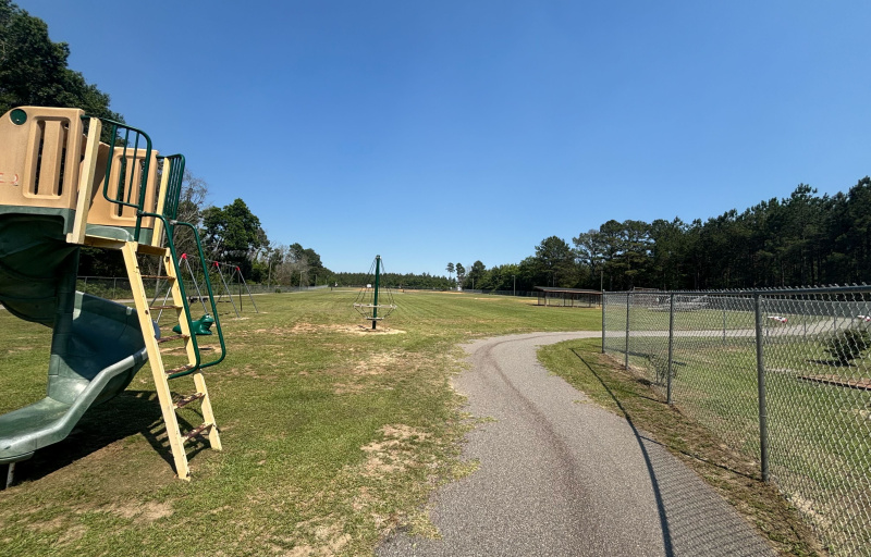 Playground equipment and trail