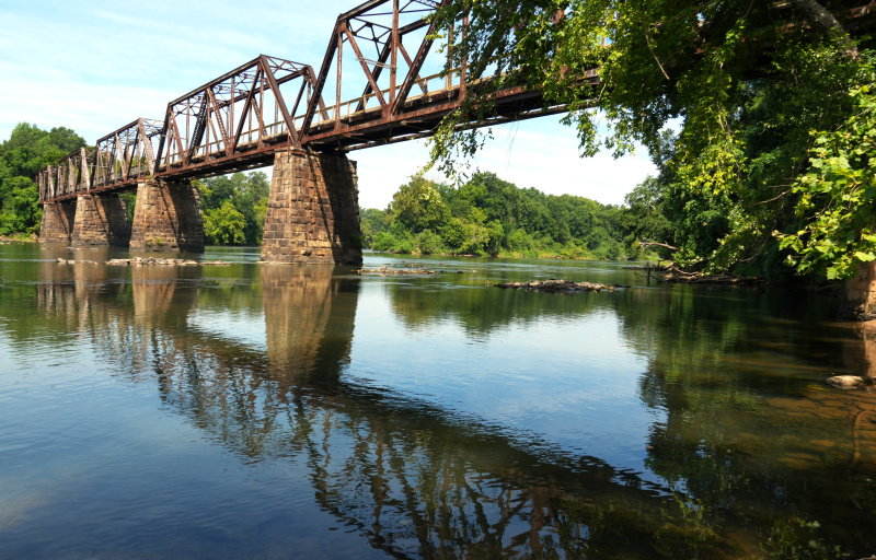 Trestle bridge over broad river