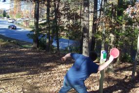 boy preparing to throw a disc on the course