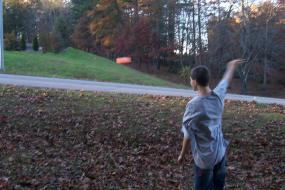 boy throwing a disc
