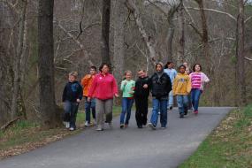 Group hiking the Mount Airy Ararat River TRACK Trail 