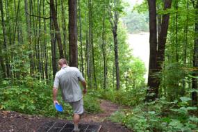 Downhill shot through trees on hole #18
