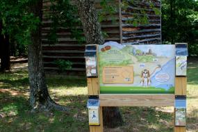 Trailhead sign with brochure