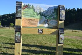 Trailhead sign with brochures
