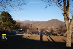 Disc golf hole with mountains in the background 