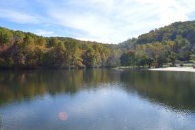 Forest surround lake in autumn