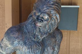 Cast bronze statue of bigfoot