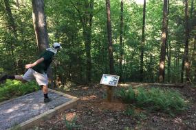 Throwing a disc off of the tee