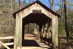 Covered wooden foot bridge