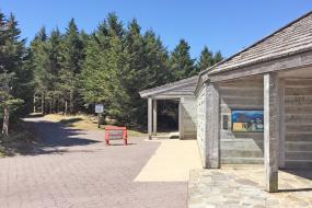 View of visitor center and TRACK Trail sign