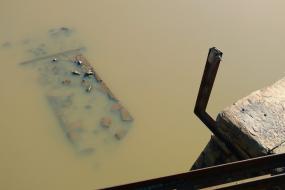 Submerged ruins of original trestle