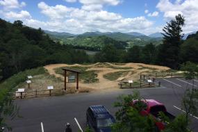 Overview shot of the pump track with mountains in the background