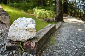 Rock at corner of trail